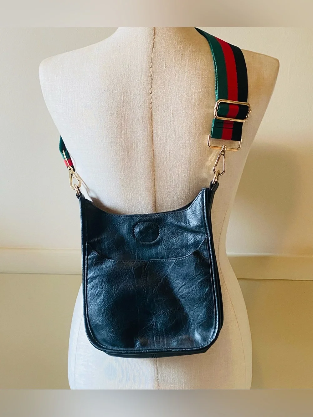 Adorned black vegan leather messenger bag with a red and green striped web stra - Picture 1 of 3